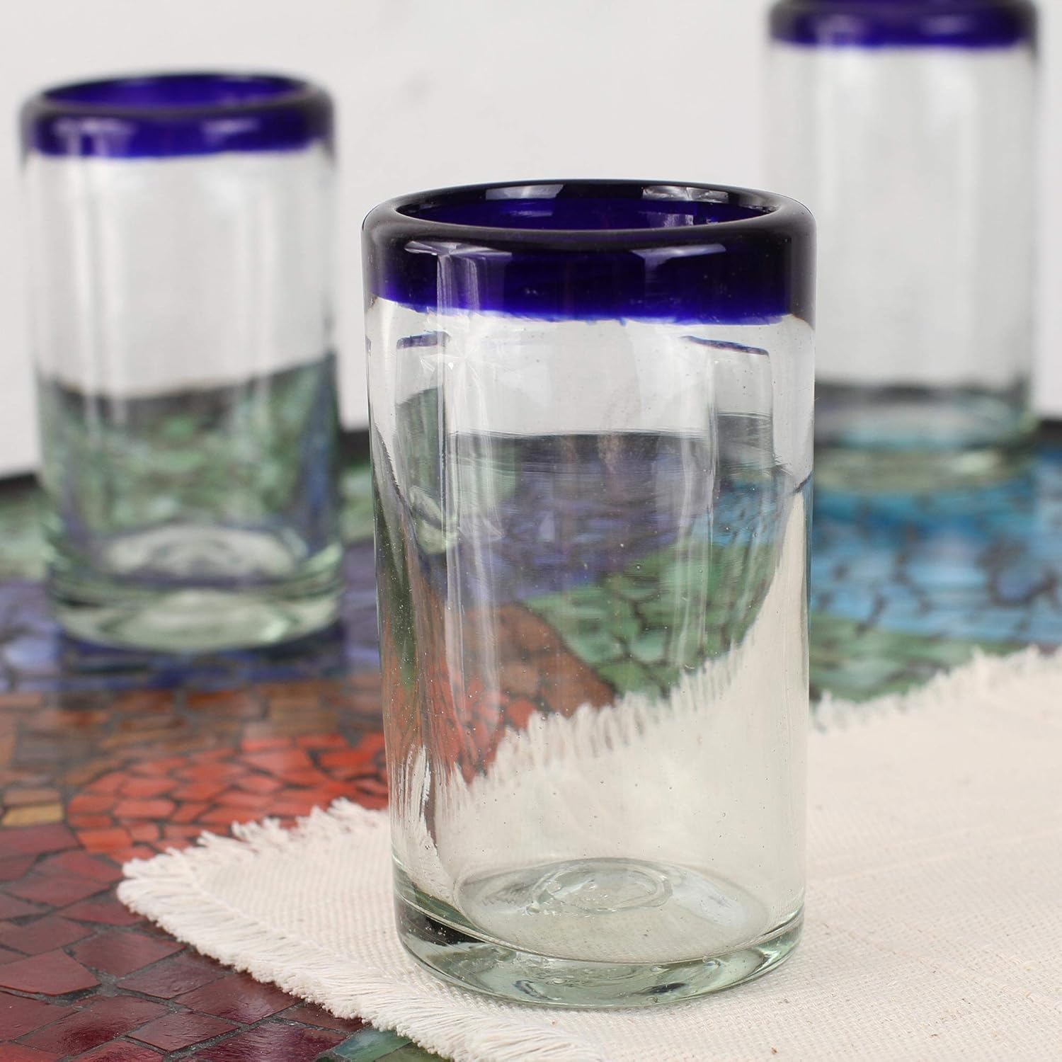 NOVICA Artisan Crafted Hand Blown Clear Blue Rim Recycled Glass Juice Glasses, 4.3In H X 2.6In Diam. 8 Oz. 'Cobalt' (Set Of 6)